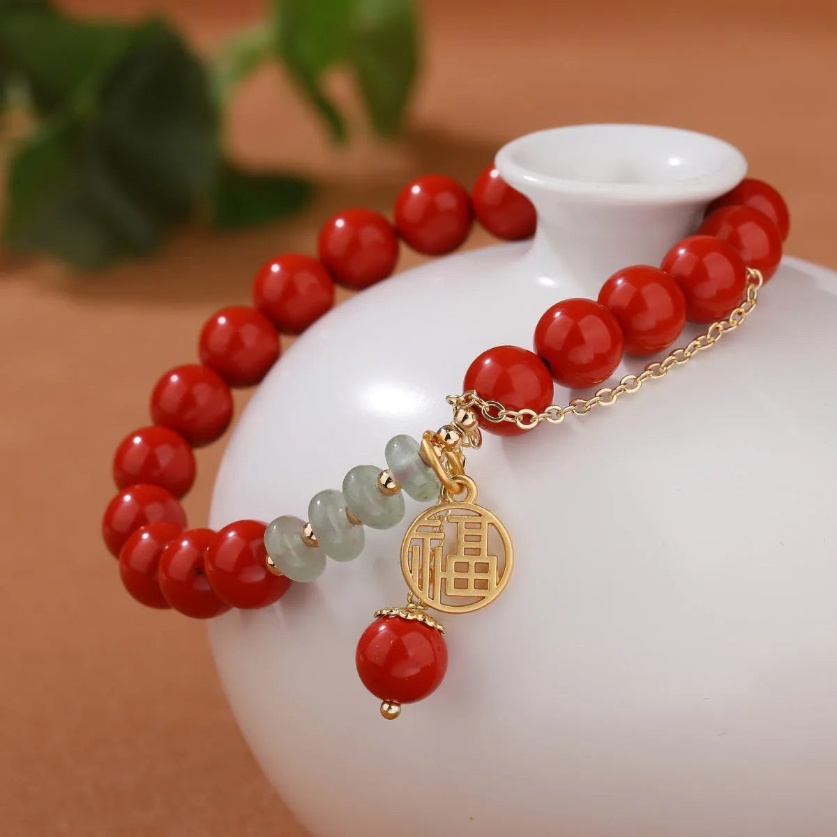 Retro red cinnabar fu character bracelet with jade beads and a long tassel