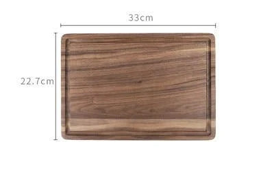 Premium black walnut wood cutting board with a versatile 2-sided design for chopping, slicing, and serving in the kitchen