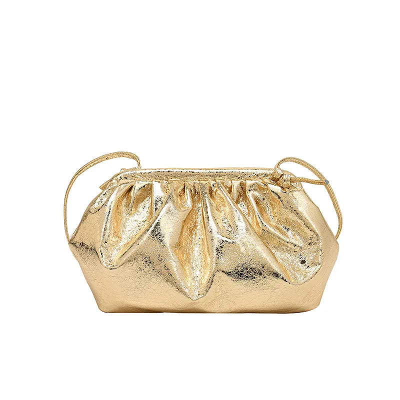 Simple hair clip closure crossbody bag in shell shape with sewing line detail on rose red PU material