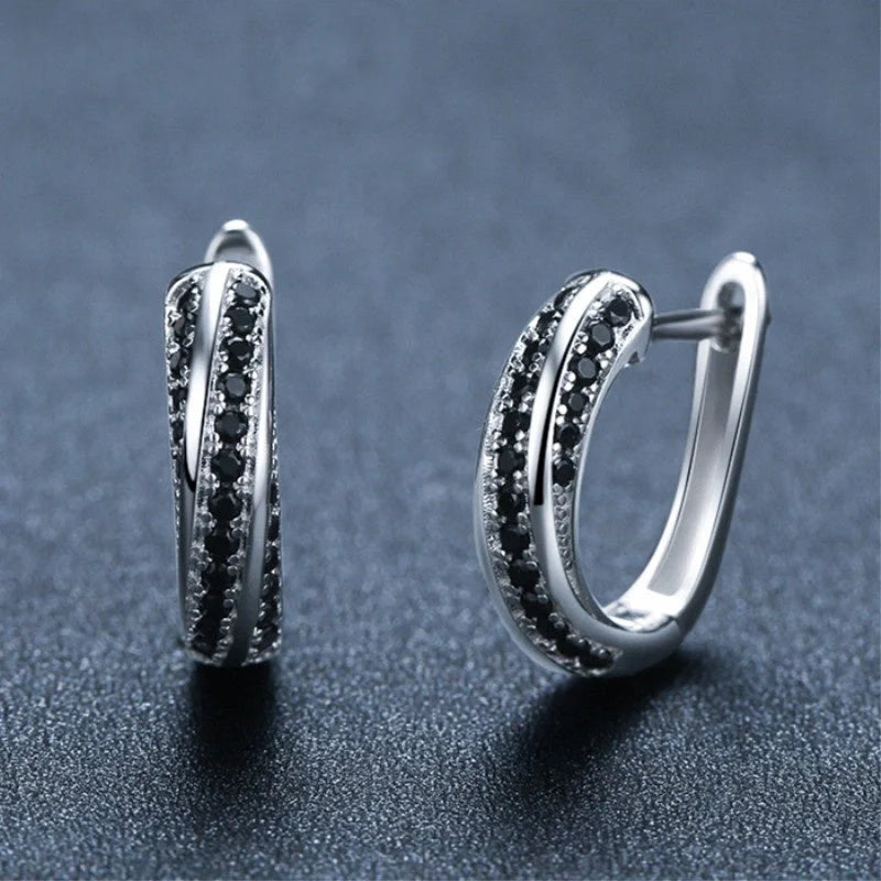 Copper inlaid zircon women's earrings with U-shaped design and round stones