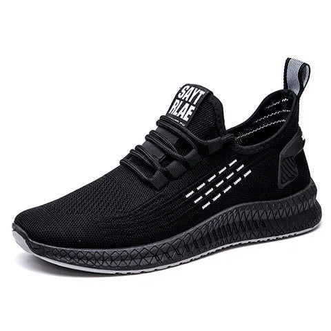 Men's black casual sports shoes with cross-strap detail on a Flying Weave upper and a flat, wear-resistant sole.