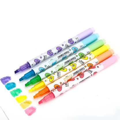 Six double-headed watercolour highlighter pens in assorted colours showing plug-in design.