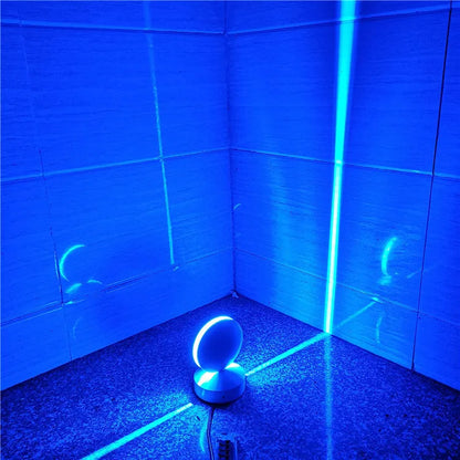 Aluminium and glass LED wall spotlight bar with colour change options, mounted on a corridor wall.