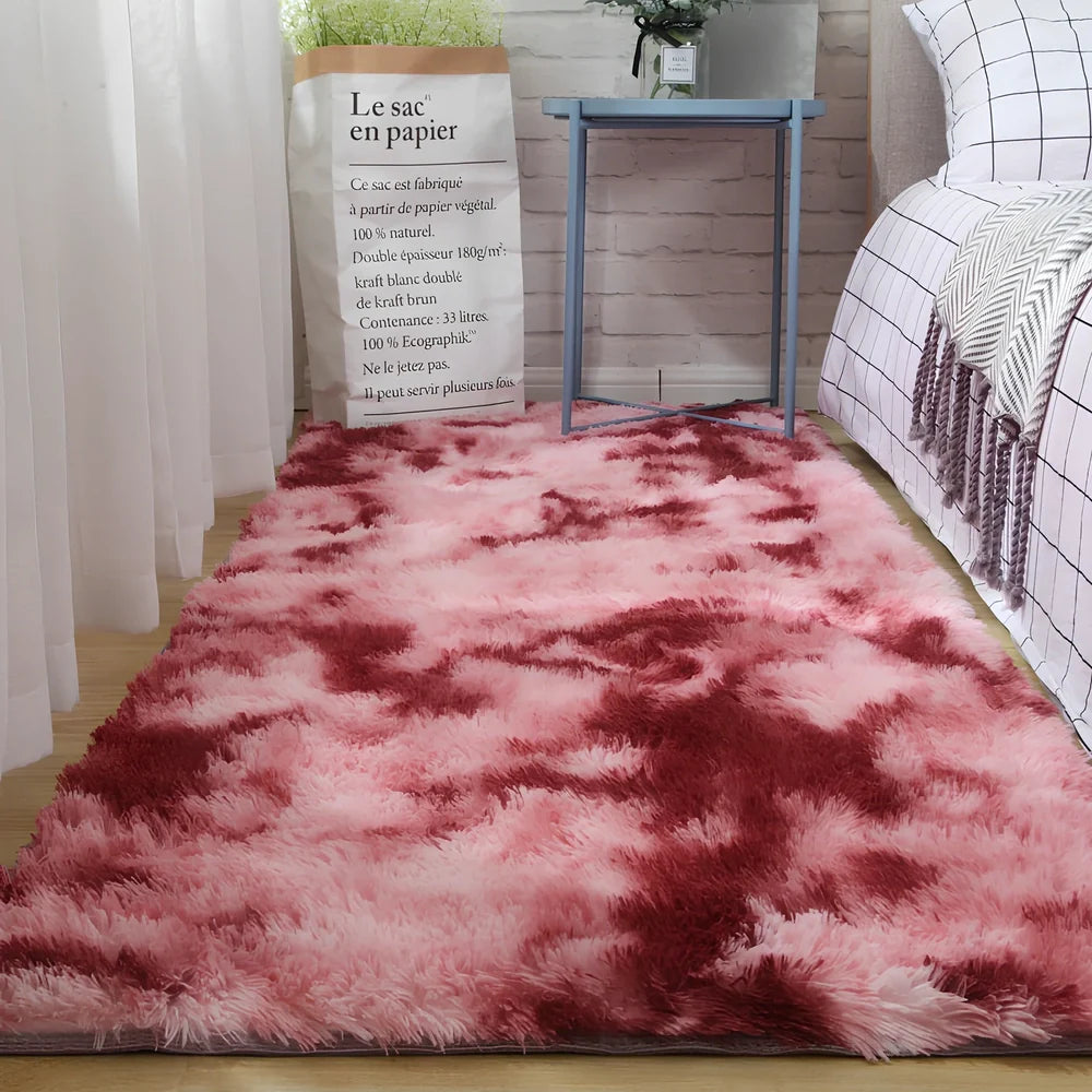 Tie-dyed variegated silk wool carpet floor mat showing organic colour patterns with polyester fibre suede backing