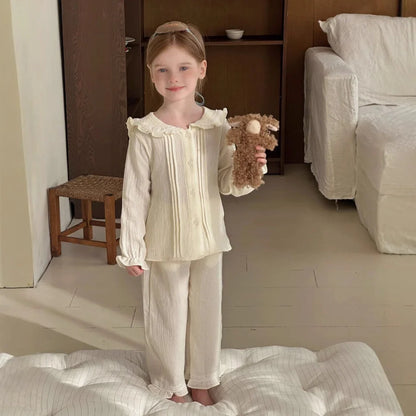 Girls' long sleeve two-piece home wear set in cotton gauze fabric with solid colour design