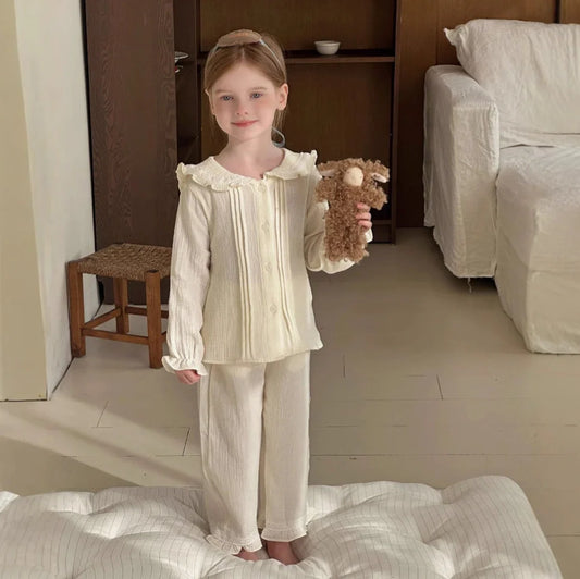 Girls' long sleeve two-piece home wear set in cotton gauze fabric with solid colour design