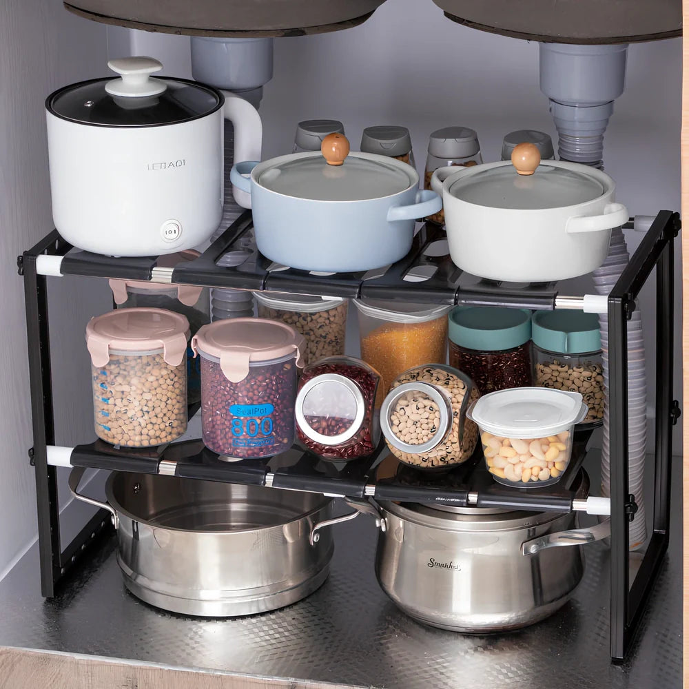 White retractable kitchen shelf with two tiers and adjustable length from 36cm to 70cm