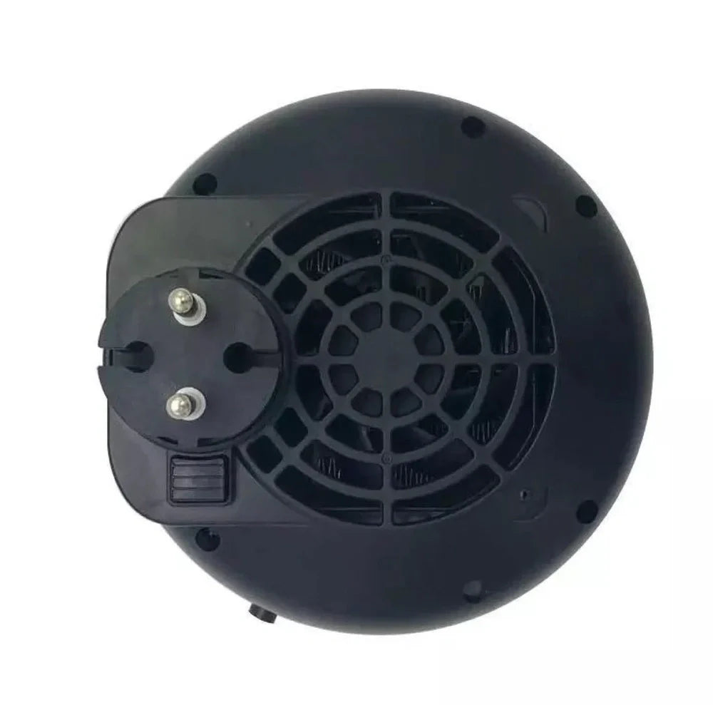 Black portable mini heater with temperature control dial showing 15-32°C range and compact design
