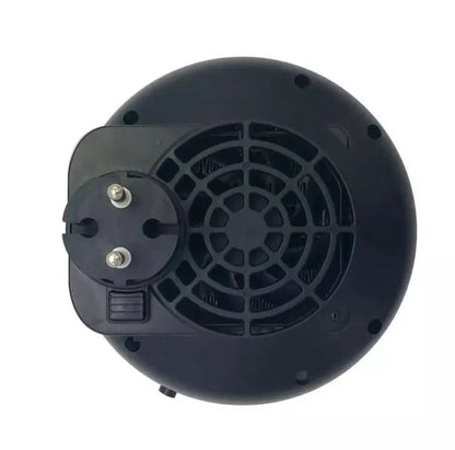 Black portable mini heater with temperature control dial showing 15-32°C range and compact design