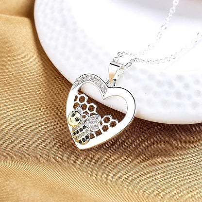 Pastoral-style bee hive pendant necklace with hearts color separation, made of copper