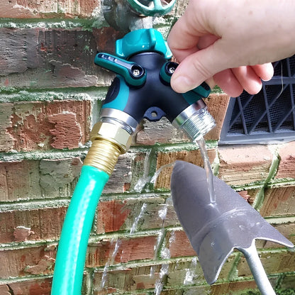 Green Y-type plastic fluid splitter with aluminium-plated copper inlet and zinc alloy outlets measuring 94x91x55mm