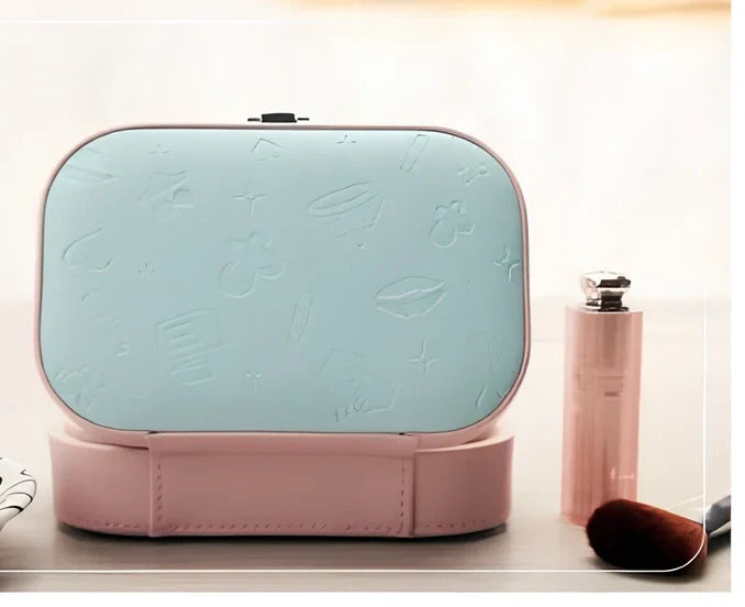 Three-layer travel jewellery box with PU leather exterior and secure closure for organised accessory storage