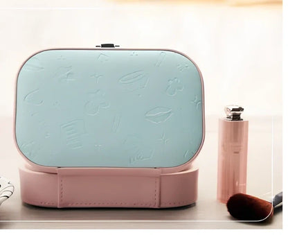 Three-layer travel jewellery box with PU leather exterior and secure closure for organised accessory storage