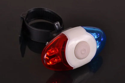 Red and blue LED bicycle tail light with adjustable mounting base showing horizontal and vertical positioning options