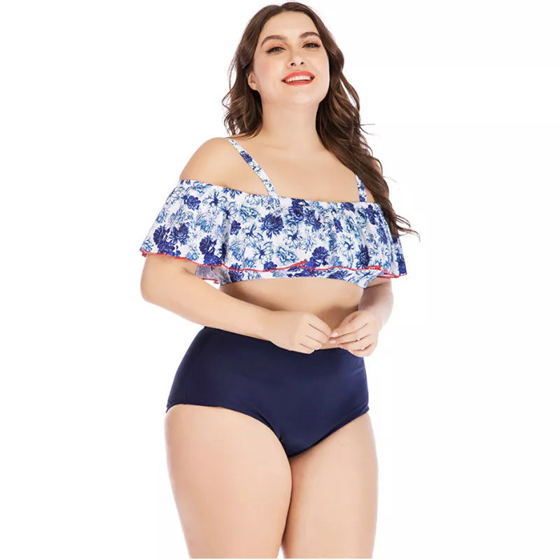 Women's printed plus size swimsuit in vibrant design, sizes XL to 4XL