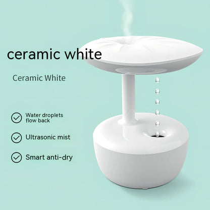White lotus leaf shaped USB humidifier with mist output and LED illumination on wooden surface