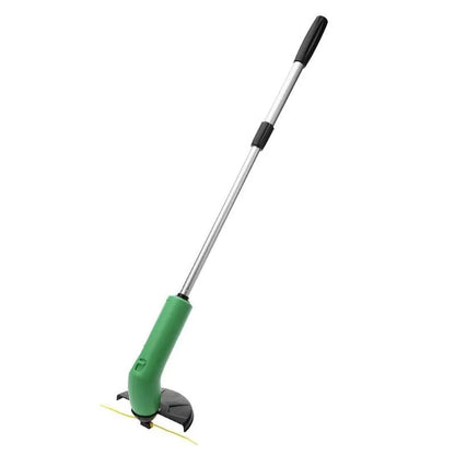Cordless handheld lawn trimmer with green housing, extension pole, debris shield, and pack of zip ties on a garden lawn.