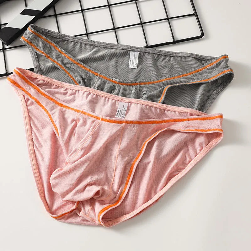 Men's modal ice silk underwear butt-lift hip underwear for men with supportive fit in dark grey, pink, yellow green, colourful blue, or sky blue available in Asian sizes M, L, XL, XXL