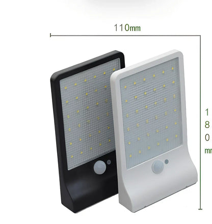 Black and white solar garden light with 36 LEDs, mounting rod option, automatic dusk operation