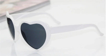 Stylish heart-shaped lighting sunglasses with a plastic frame and resin lenses, creating a mesmerizing effect for romantic occasions