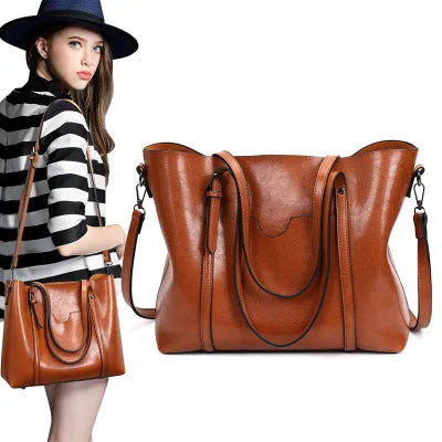 Retro messenger bag showing 31cm length, A4 magazine capacity, available in eight colours including wine red and light blue