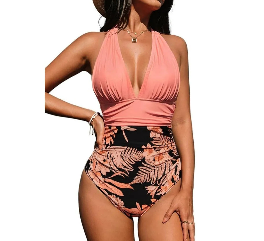 Women's halter neck one-piece swimsuit in quick-drying polyester fabric on a mannequin.