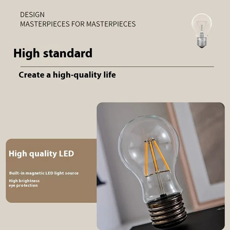 Suspension bulb night lamp on black wood grain base with iron art frame, 11cm square dimensions