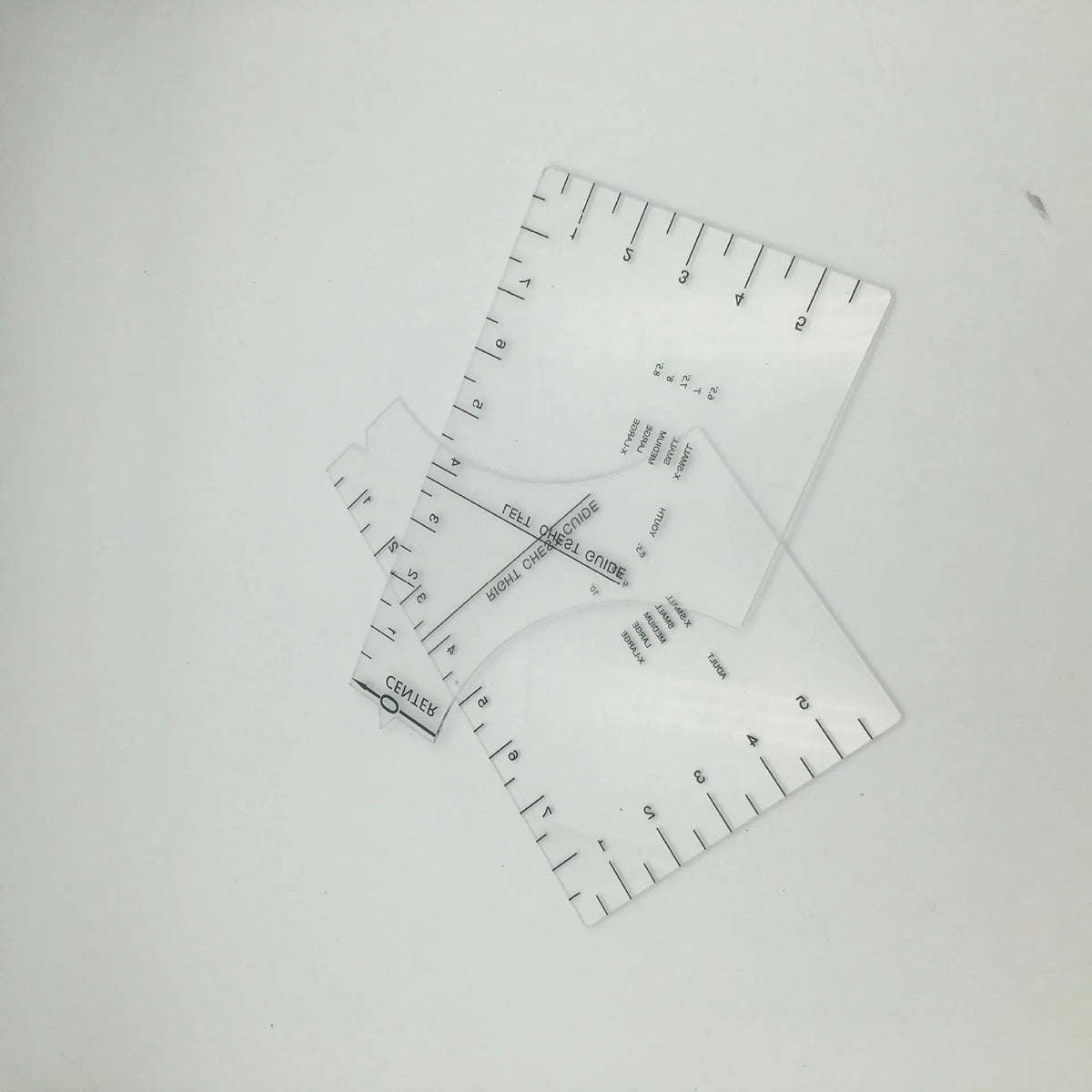 Transparent acrylic sewing patch ruler measuring 10x6 inches for T-shirt alignment