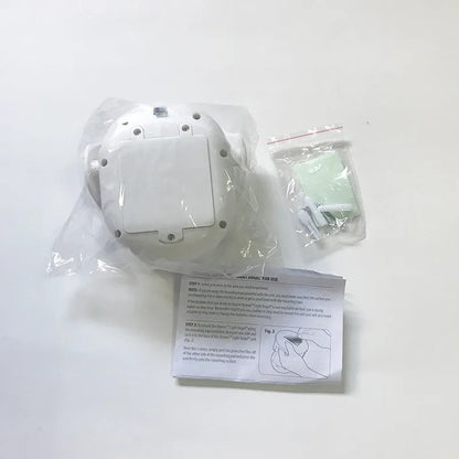 White Atomic Angel touch-control induction night light showing compact design
