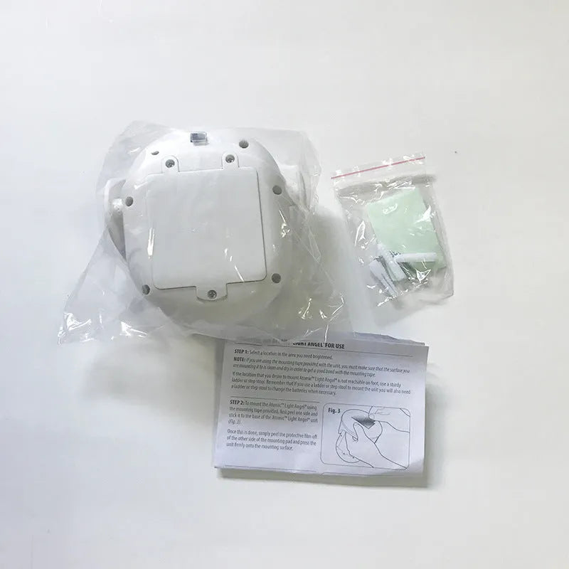 Atomic Angel induction night light with touch-activated dimming control and colour change function, featuring durable ABS construction and energy-efficient LED illumination for bedrooms, nurseries, and hallways