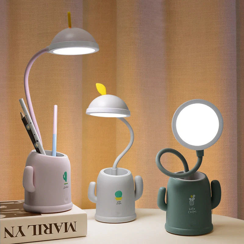 Cactus-shaped table lamp with pen holder and USB cable, available in green, pink, and grey