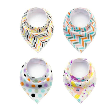 Stylish baby bibs and burp cloths featuring trendy arrow, wave, and triangle designs in soft, absorbent cotton