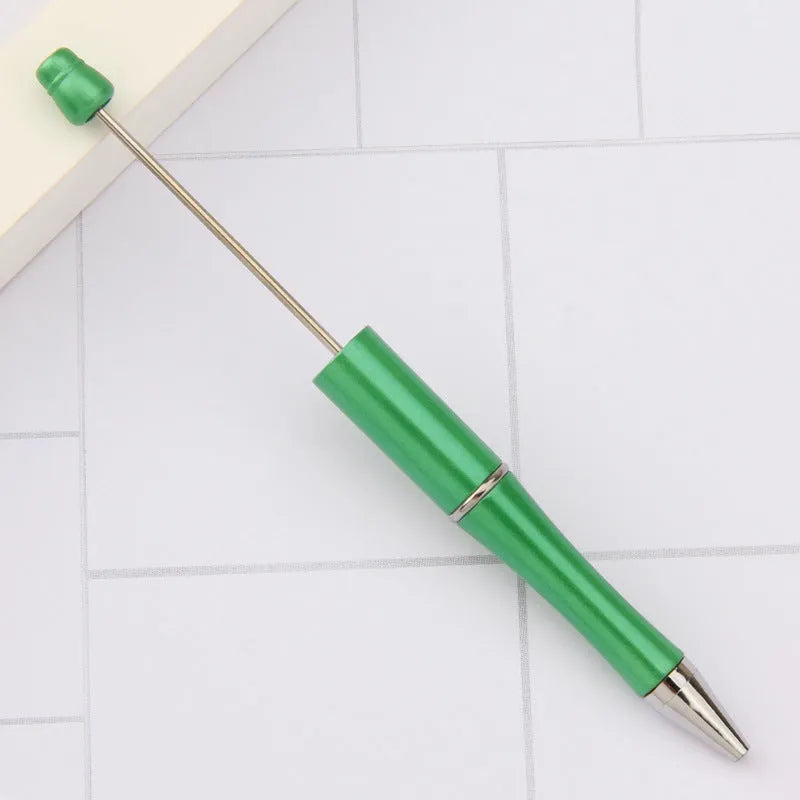 Rotating bead ballpoint pen in gradient colour with ABS plastic and steel wire construction