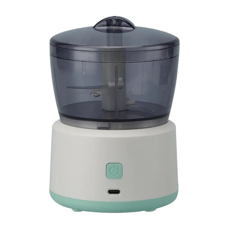 Mini electric meat grinder with transparent cup and stainless steel blades