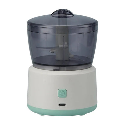 Mini electric meat grinder with transparent cup and stainless steel blades