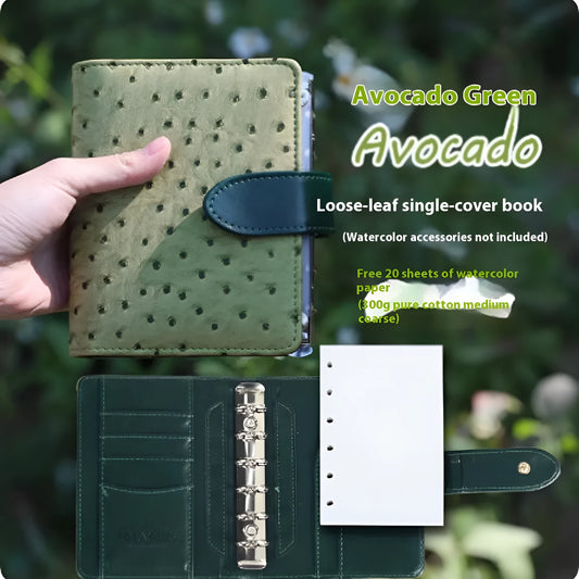 A7 sized loose-leaf watercolour notebook with textured cover, open to show flat-laying pages.
