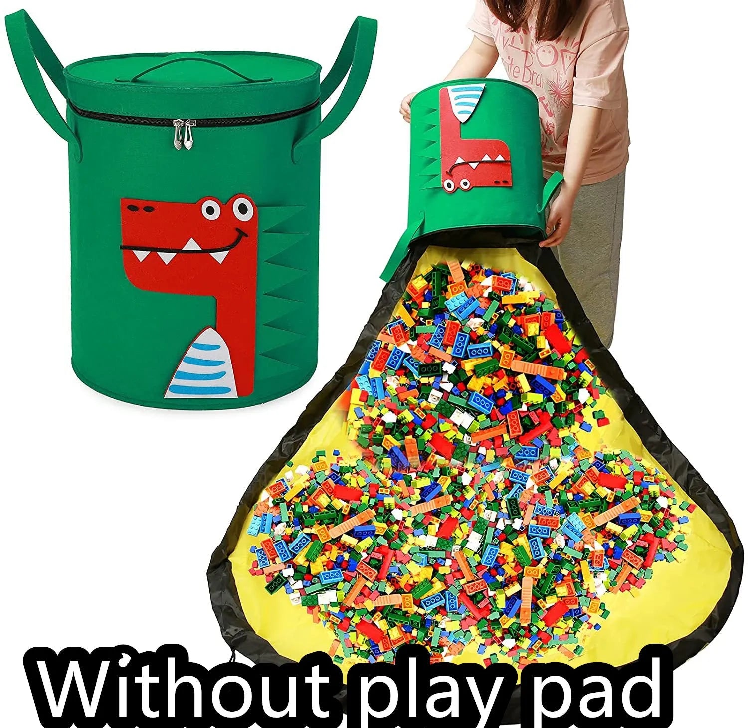 Green felt storage cube with pull rope unfolded into a large square play mat on a wooden floor.