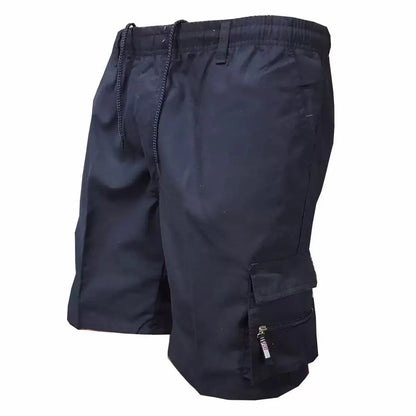 Man wearing loose-fit beige casual work pants with an elastic waistband.