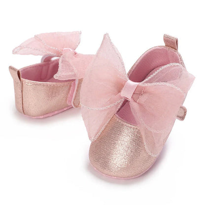 Girls' soft-soled toddler shoes with Velcro fastening in princess style, showing non-slip sole detail