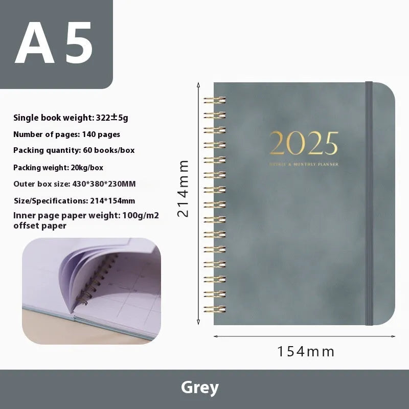 A5 size PU leather notebook with metal coil binding in a choice of colours including black, blue, and brown.