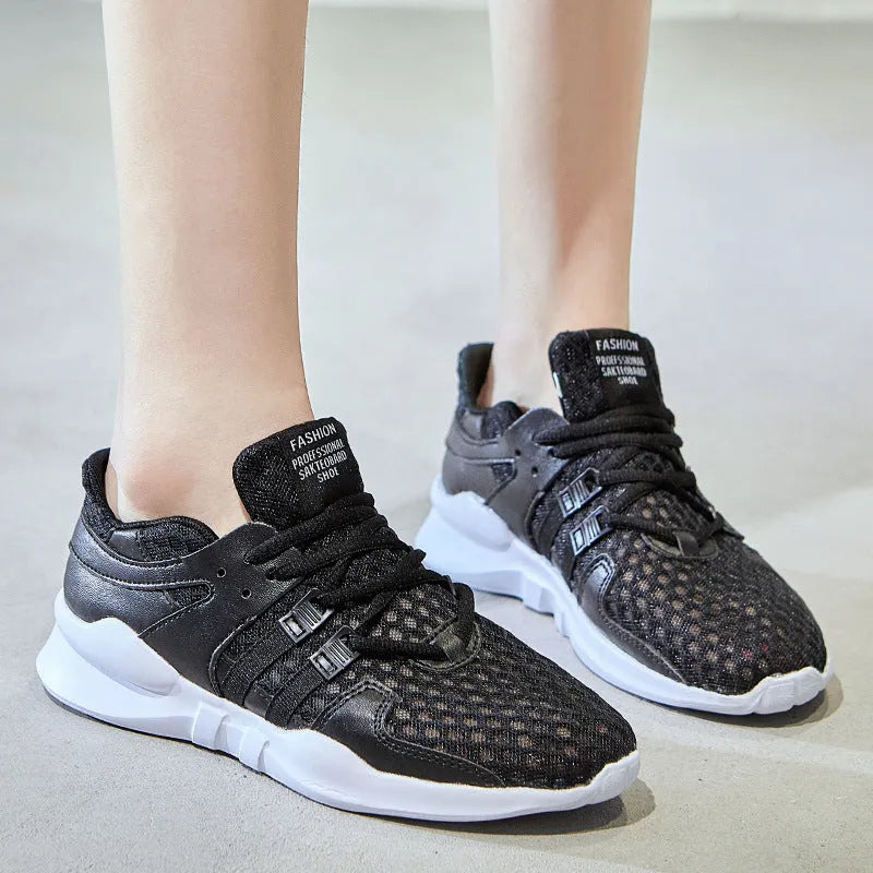 Low-top casual sneaker in mesh with hollow-out design and round toe.
