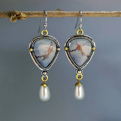 Retro blue geometric drop earrings with synthetic opal and pearl detail on a metal base.