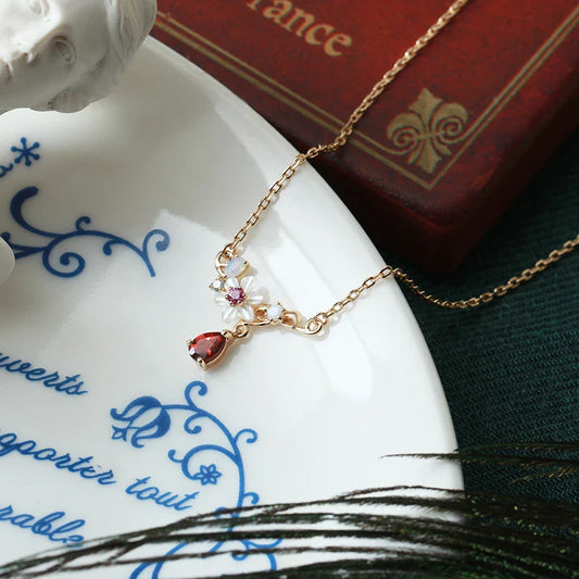 Moissanite natural shell water drop necklace with floral and tassel accents, crafted in premium silver electroplating