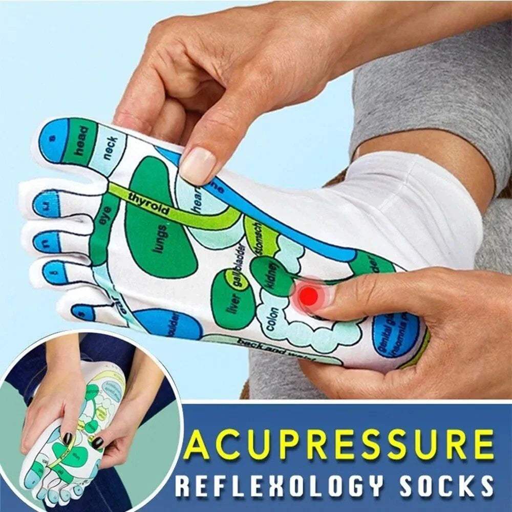 Pair of white acupressure massage reflexology socks with detailed foot illustration