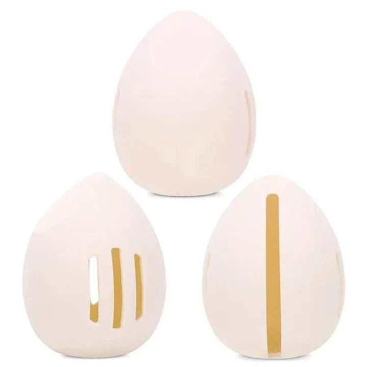 Compact silicone makeup sponge holder in pink color, designed to keep beauty blenders clean and organized