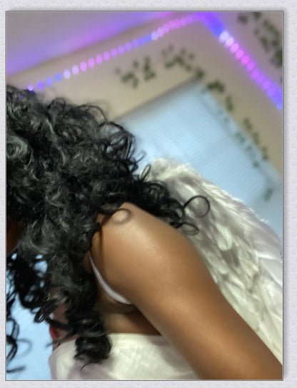 Pair of large, feathered wings in black and white colors, perfect for Halloween costumes and fantasy-themed events.