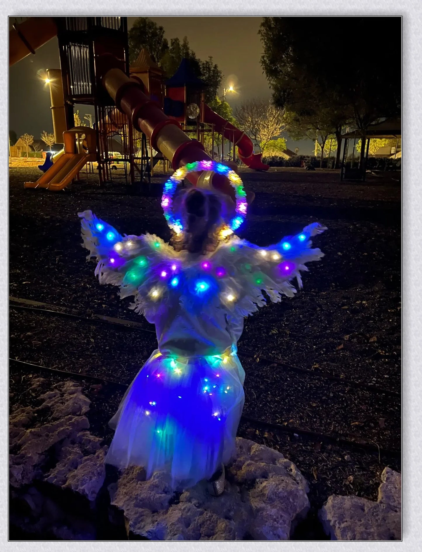 Pair of large, feathered wings in black and white colors, perfect for Halloween costumes and fantasy-themed events.