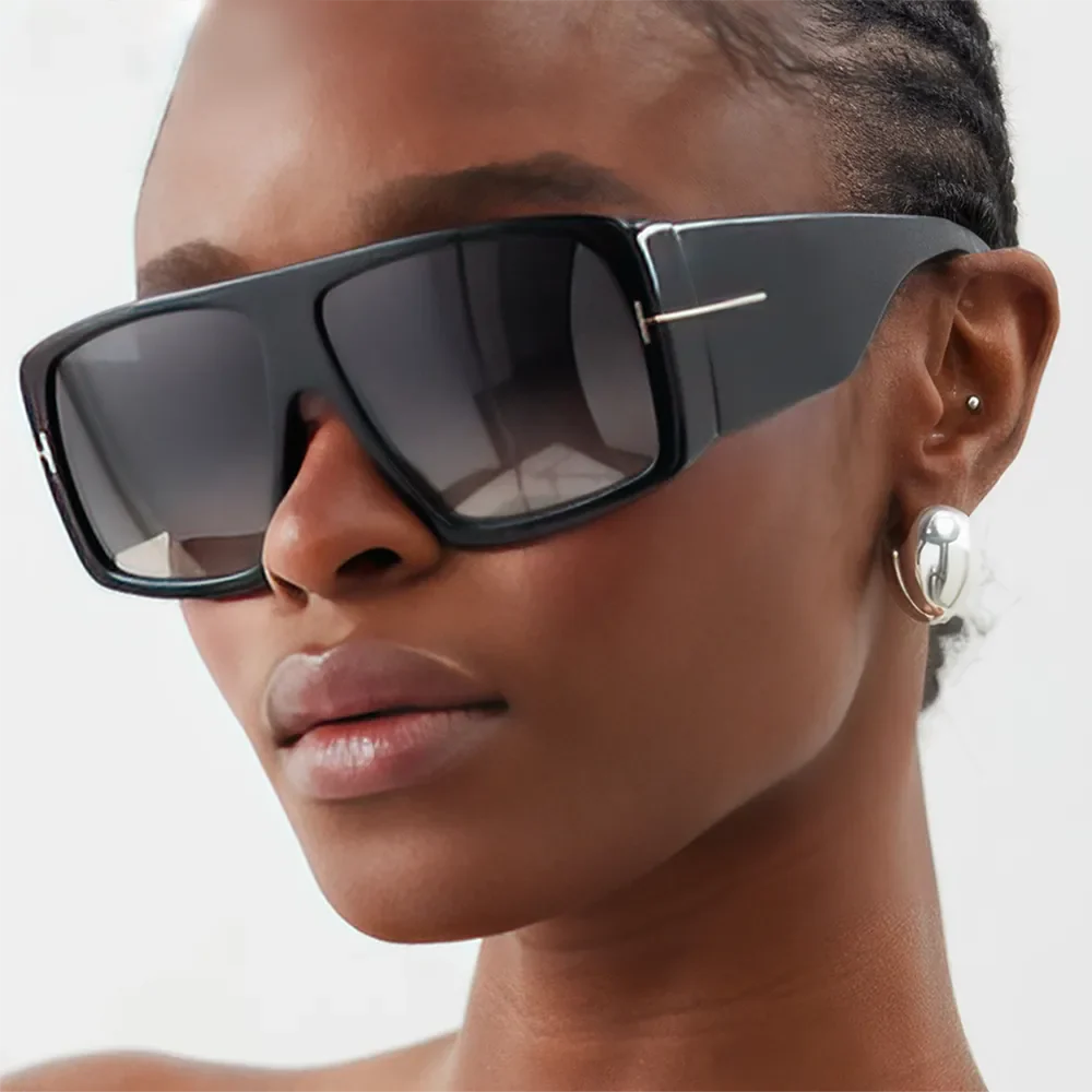 Oversized square sunglasses in matte gray color with gradient lenses, offering a bold and trendy look with UV protection.