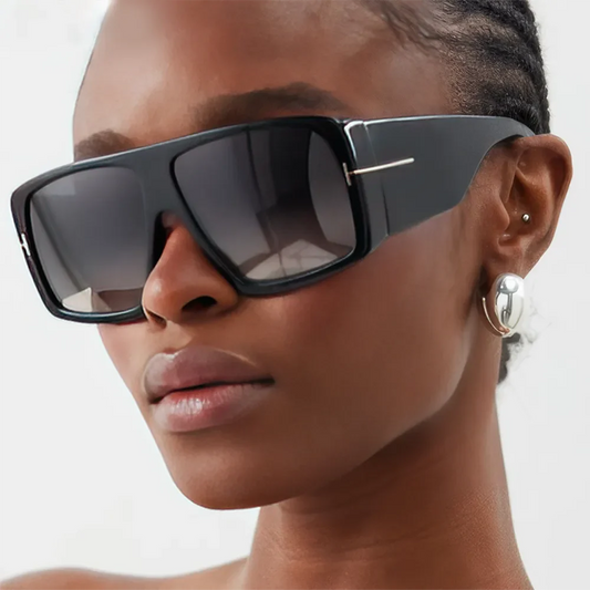 Oversized square sunglasses in matte gray color with gradient lenses, offering a bold and trendy look with UV protection.