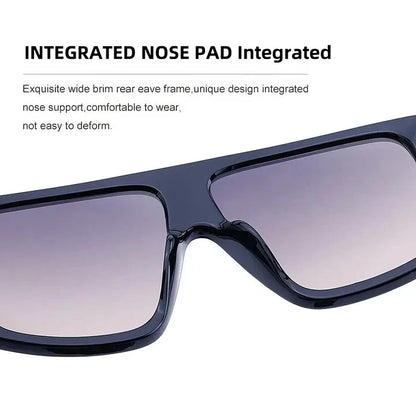 Oversized square sunglasses in matte gray color with gradient lenses, offering a bold and trendy look with UV protection.